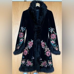 Vintage velvet coat with colorful embroidered flowers by Betsey Johnson.